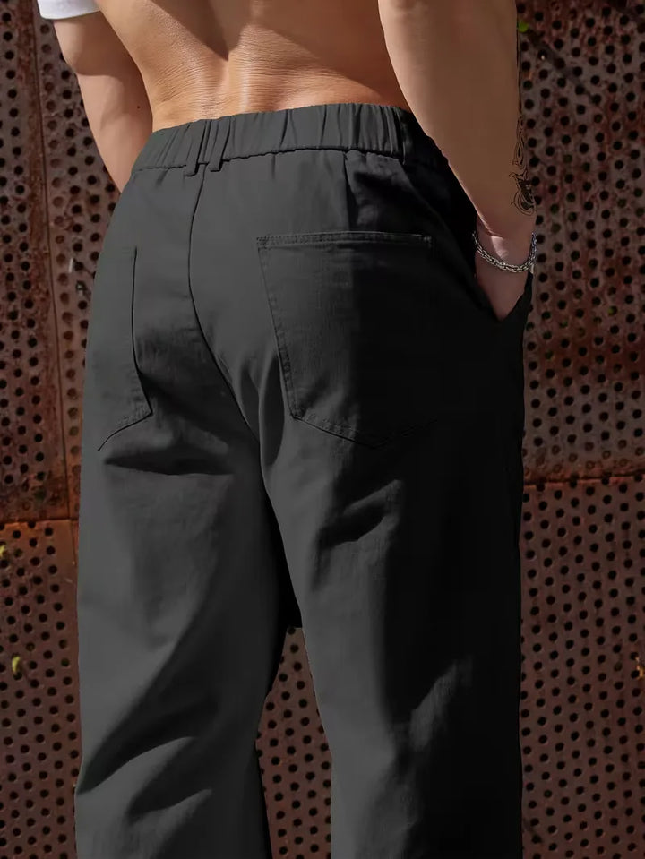 Comfortabele heren pantalon met elastische band en zakken, praktisch en stijlvol.