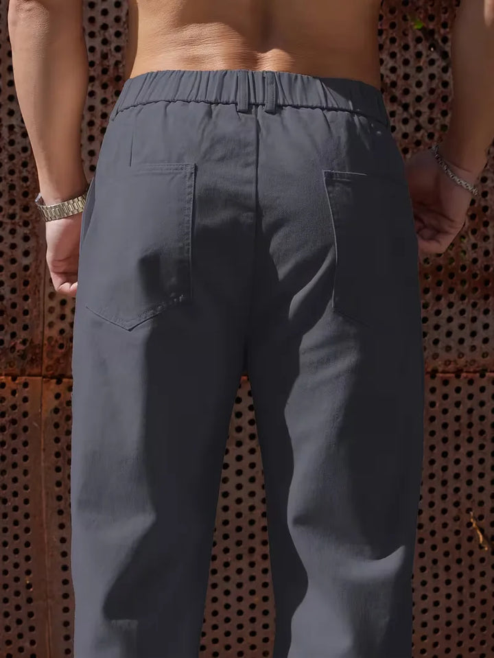 Lente/zomer heren pantalon met elastische band, biedt zowel comfort als stijl.