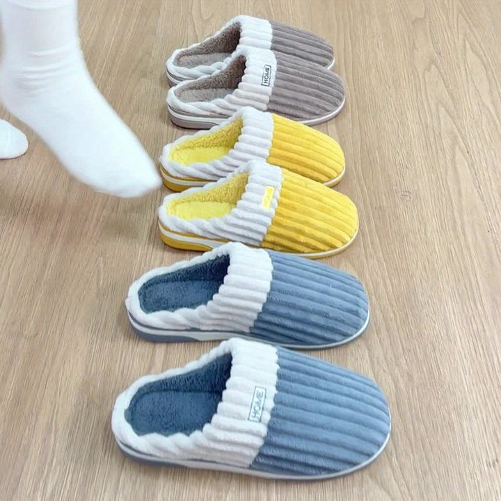 Praktische heren pantoffels met waterdichte zool, ideaal voor binnenshuis.