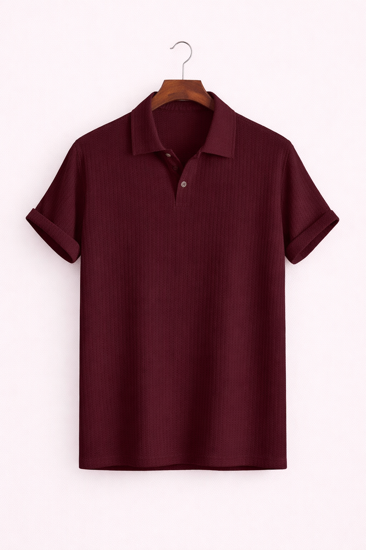 Zomerse heren polo met comfortabele pasvorm, button-down kraag en ademende structuurstof.