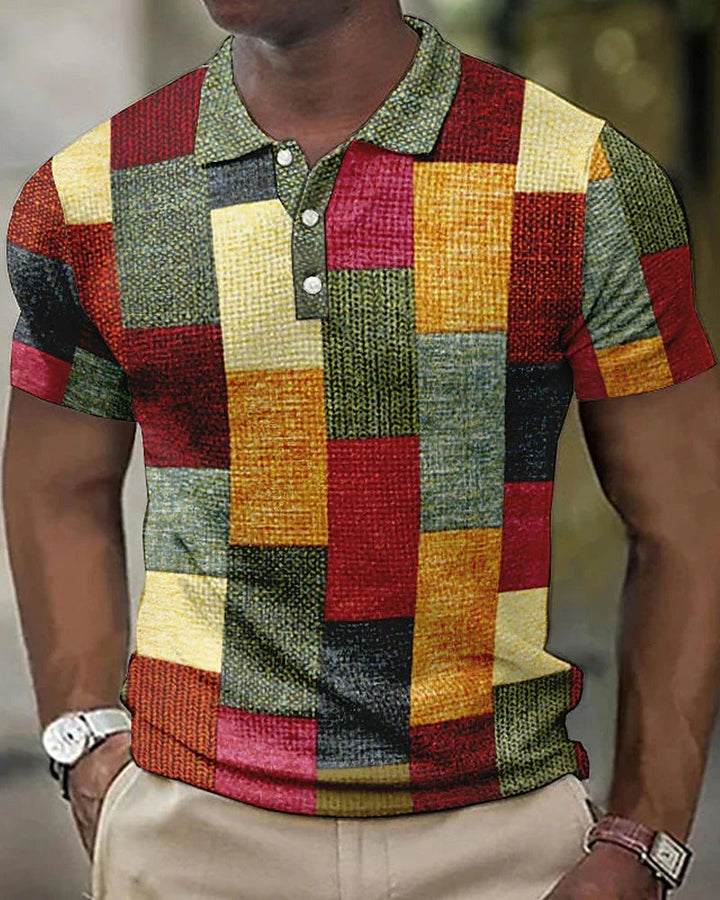 Close-up van herenpolo met gedetailleerd 3D rasterpatroon, stijlvol en comfortabel, perfect voor de moderne man.