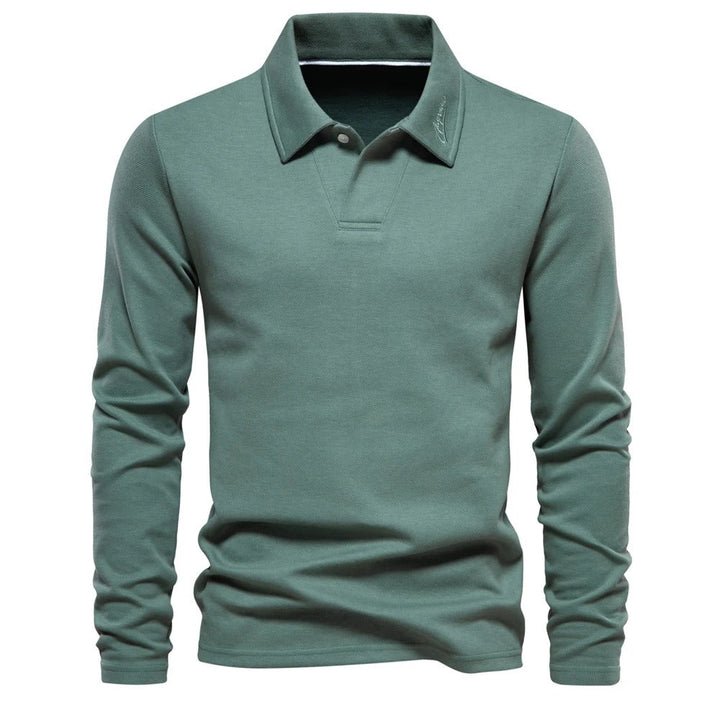 Tijdloos heren poloshirt lange mouw, veelzijdig voor casual en elegante herfstoutfits, een modeklassieker.