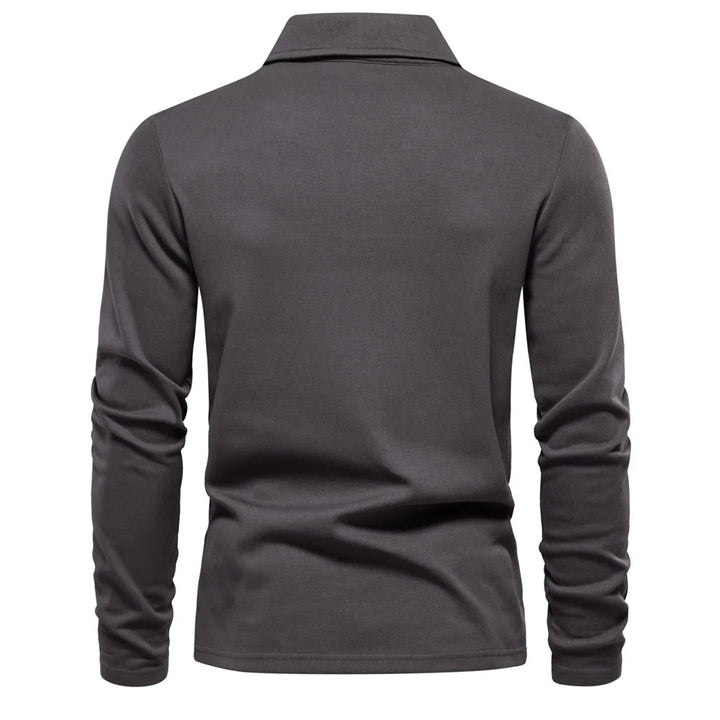 Veelzijdig heren poloshirt lange mouw, tijdloze look, perfect te combineren voor casual lente/herfst mode.