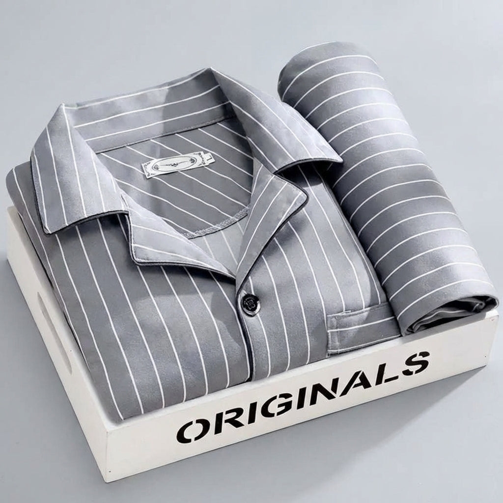 Heren pyjama bovenstuk met lange mouwen en knopen, detailopname van de stof