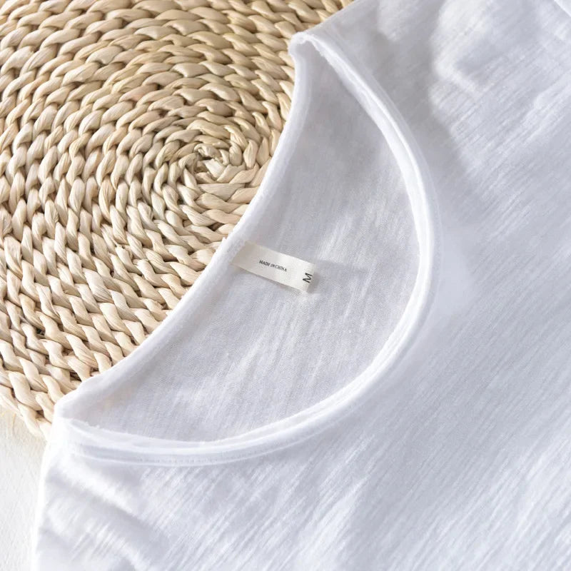 Retro heren t-shirt, effen, met o-hals en stijlvolle ruwe rand voor een nonchalante look.