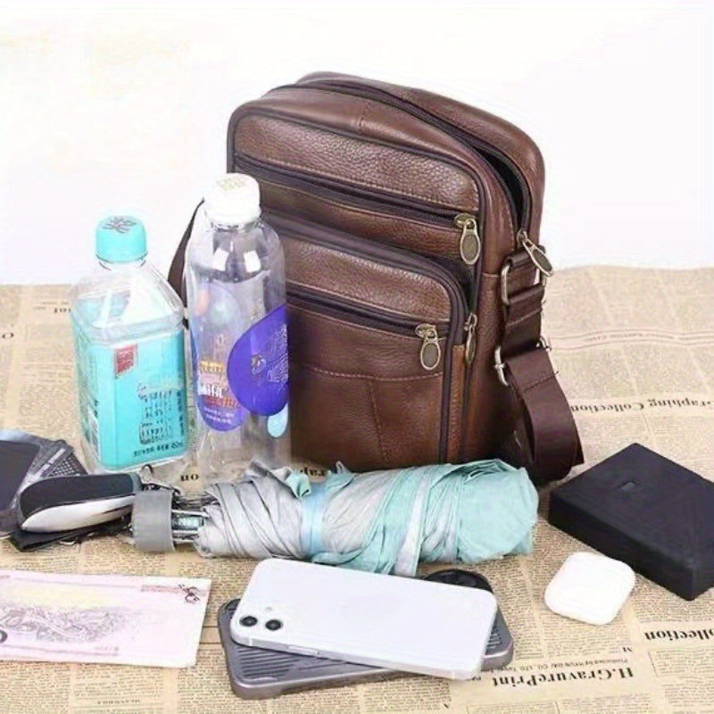 Heren schoudertas in echt leer, ruime capaciteit, meerdere vakken, verstelbare schouderband. Stijlvol en functioneel design.