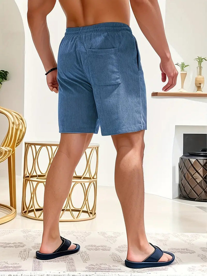 Veelzijdige heren shorts met elastische taille voor sport en ontspanning.