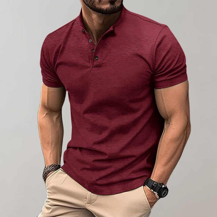 Heren slim fit polo met korte mouw, staande kraag en knoopsluiting, ideaal voor smart casual zomerlooks.