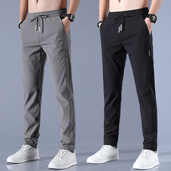 Heren sneldrogende stretchbroek voor zomer en training, comfortabele casual jogger.