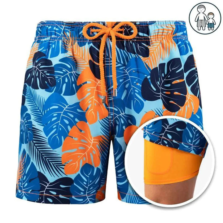 Man draagt sneldrogende zwembroek op het strand, genietend van de zon en zee