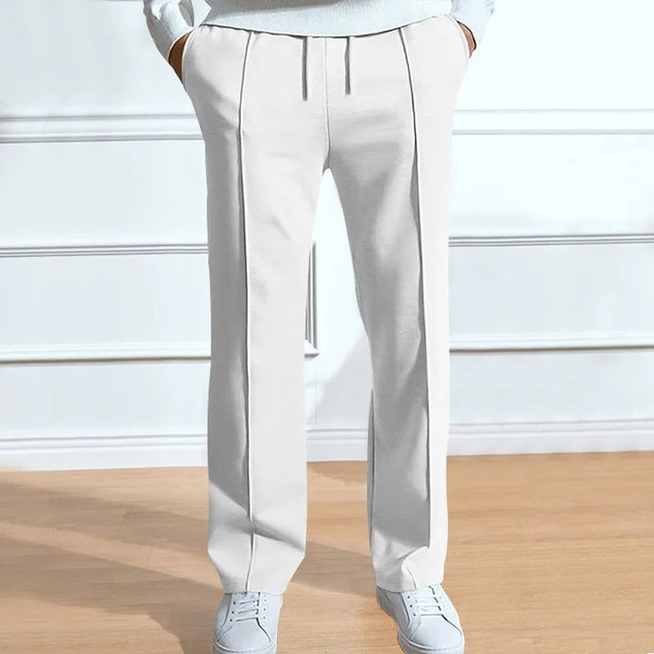 Elegante herenbroek, flexibele pasvorm, perfect voor een verzorgde look. Geschikt voor kantoor of casual gelegenheden.
