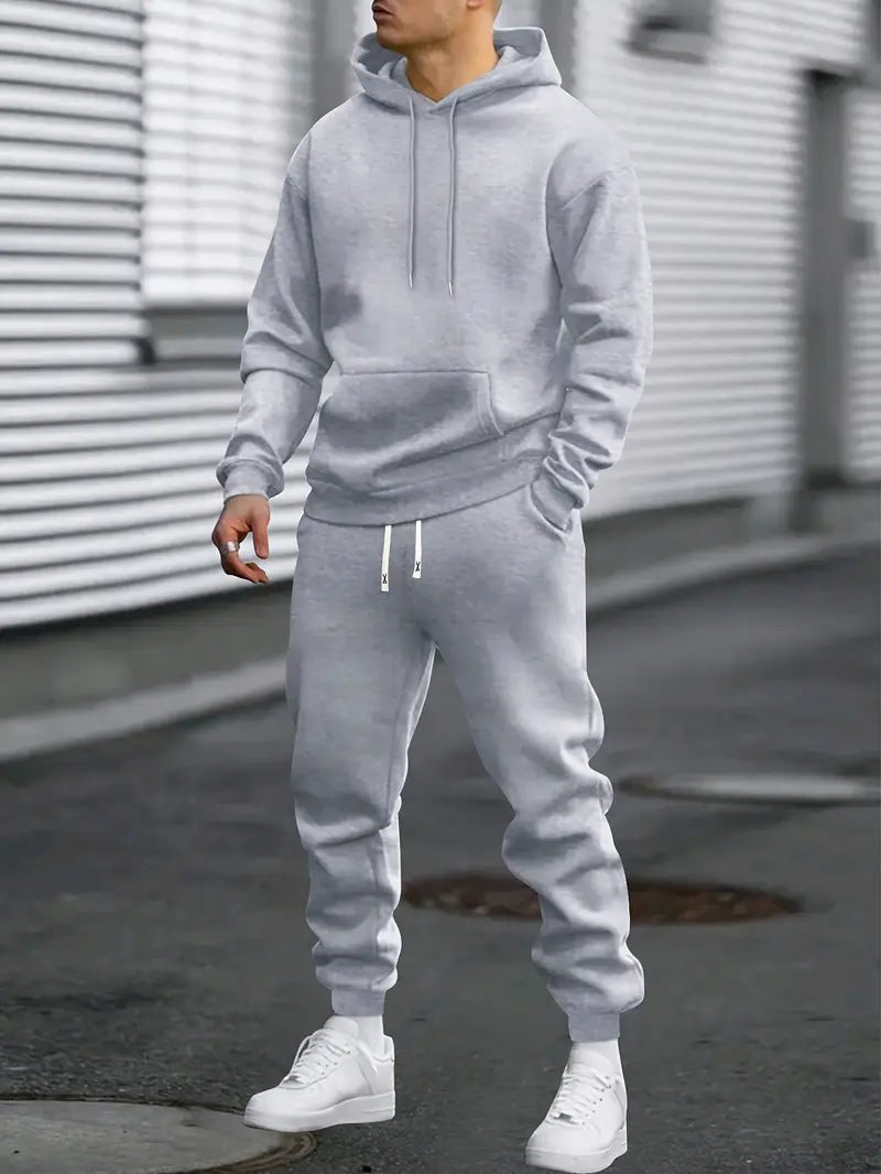 Casual heren hoodie joggingpak, perfect voor ontspanning of sportieve activiteiten, met taps toelopende broek.