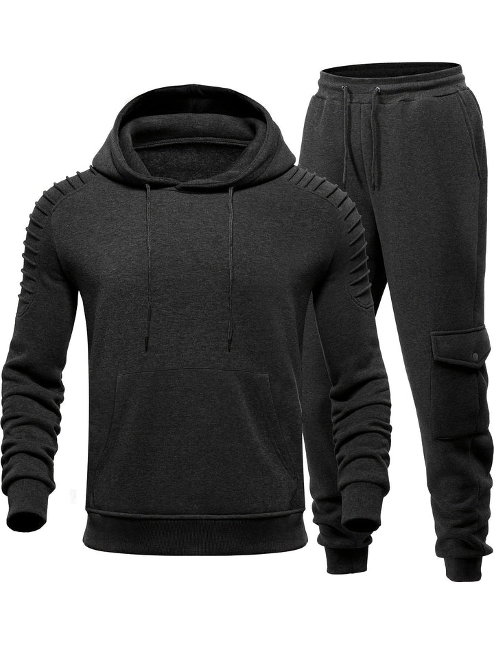 Stijlvol heren trainingspak in zachte stof, inclusief joggingbroek en top met lange mouwen voor dagelijks comfort.