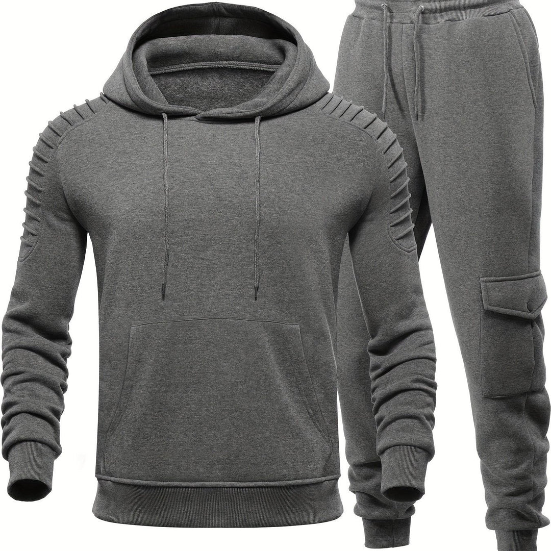 Trendy heren sportset: compleet trainingspak met lange mouwen en joggingbroek, perfect voor een casual look.