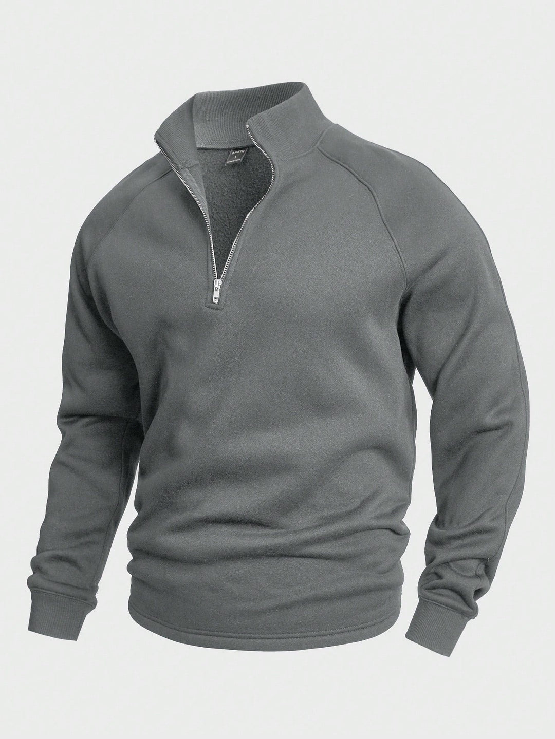 Sportieve heren trui met halve rits. Perfect als winterkleding of voor een gelaagde look, makkelijk te onderhouden.