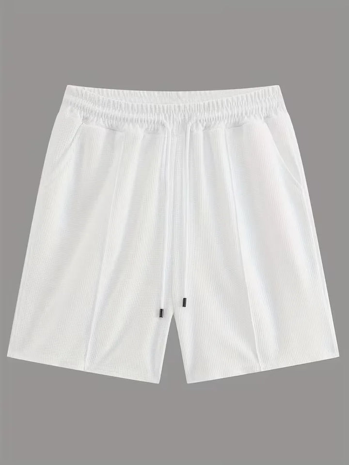 Ademende heren sportieve set: T-shirt & shorts, ideaal voor workouts of vrije tijd.