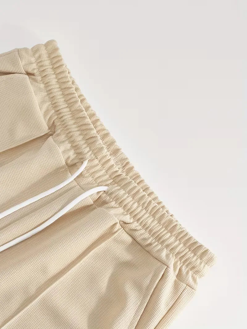 Heren sportieve zomer set: ademend T-shirt en shorts, ideaal voor buitenactiviteiten.