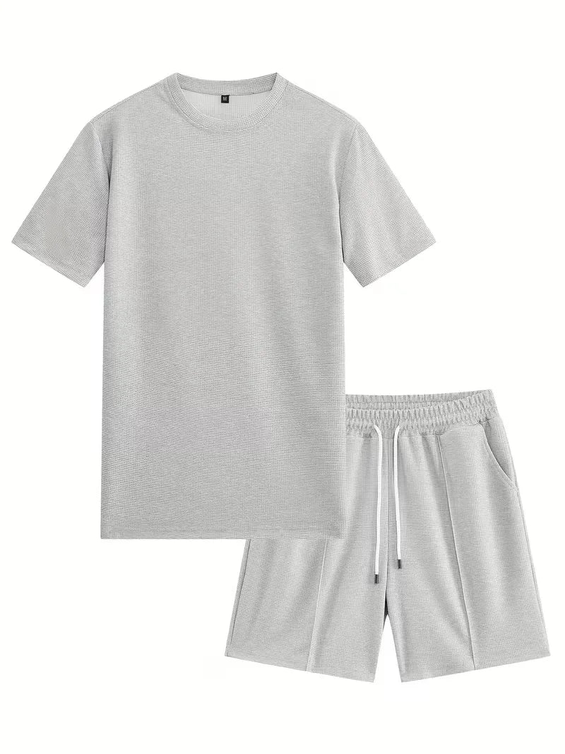 Zomerse heren set: ademend T-shirt en shorts voor ultiem comfort op warme dagen.