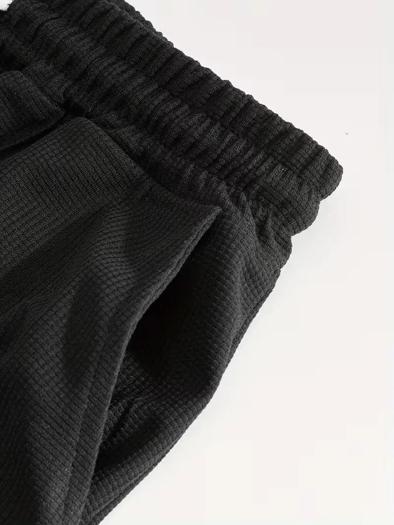 Ademende heren lounge set: perfect voor warme zomerdagen, inclusief T-shirt en shorts.