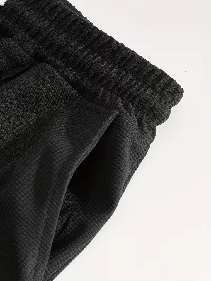 Ademende heren lounge set: perfect voor warme zomerdagen, inclusief T-shirt en shorts.