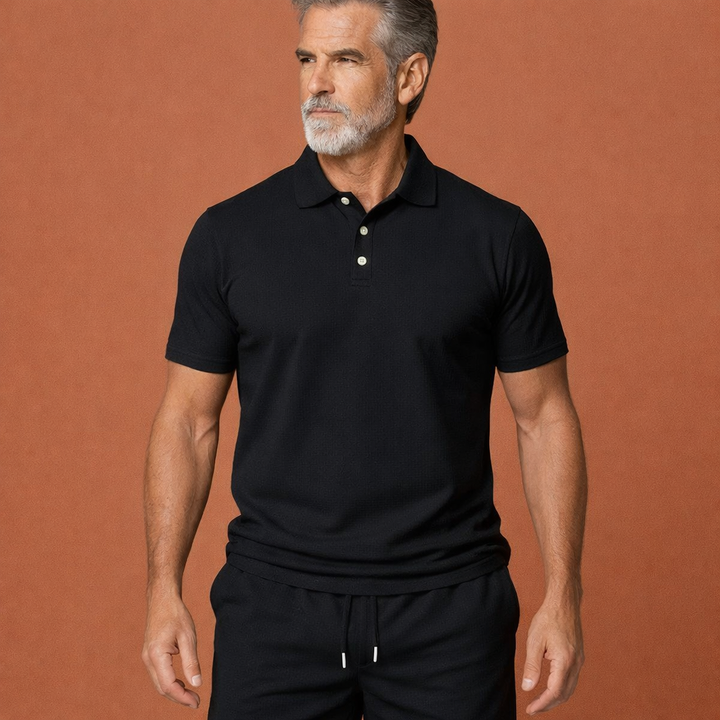Stijlvolle heren tweedelige zomerset: casual polo met korte mouwen en bijpassende shorts, perfect voor zomerse dagen.