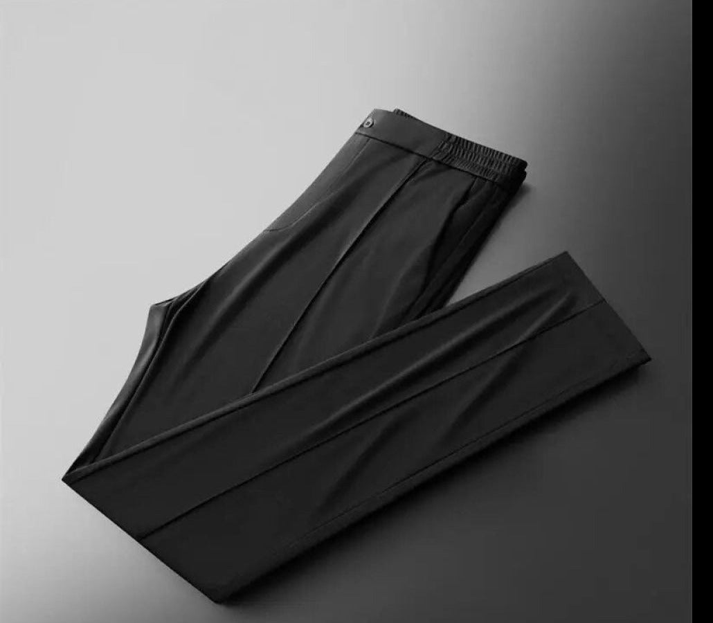 Herenmode: tweedelige linnen set, poloshirt en broek, voor een moeiteloos stijlvolle look.