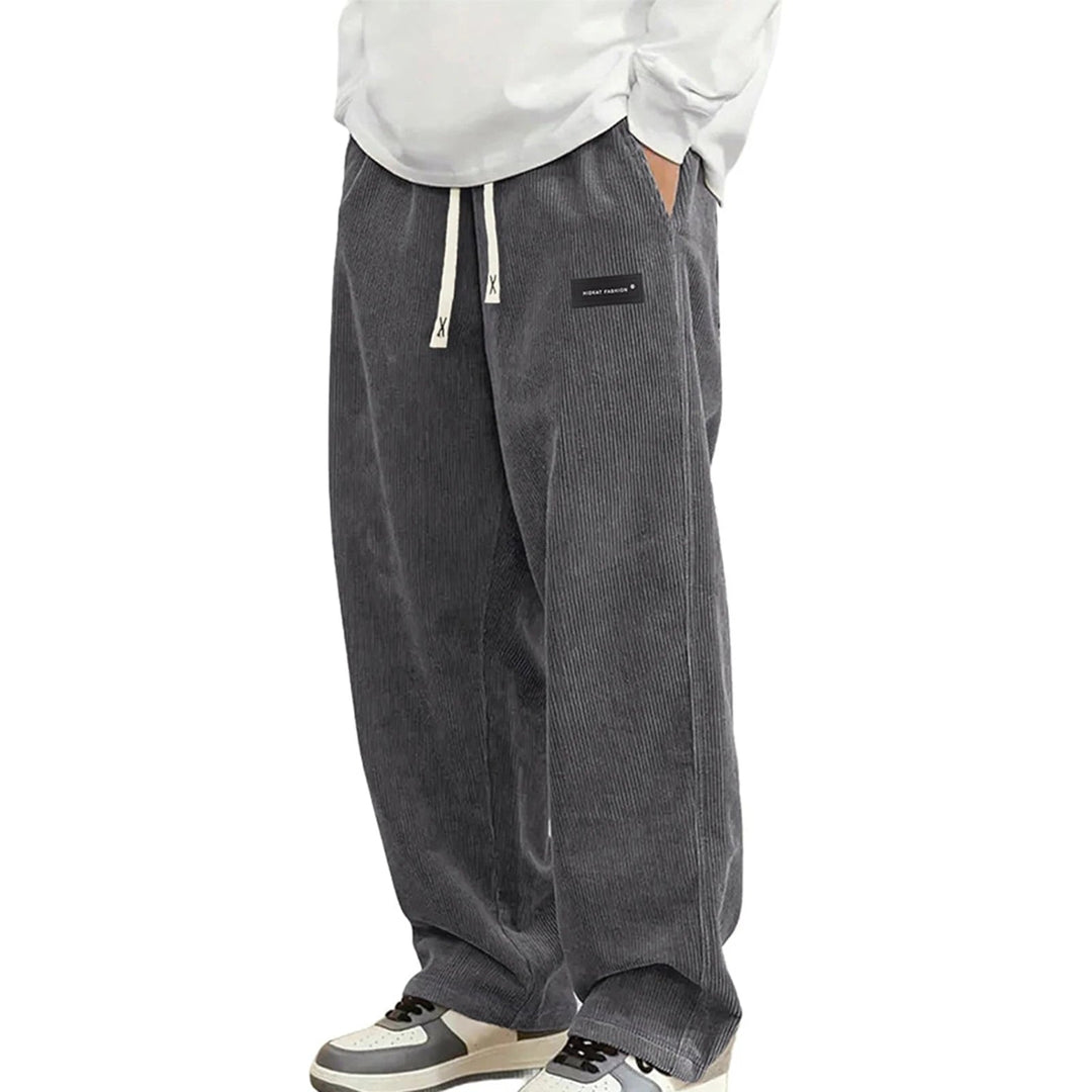 Stijlvolle heren wijde jogger broek met elastische tailleband, ideaal voor comfort en streetwear.