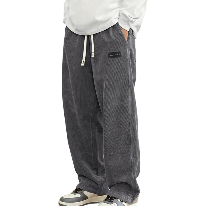 Stijlvolle heren wijde jogger broek met elastische tailleband, ideaal voor comfort en streetwear.