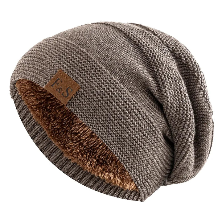Heren wintermuts in grijs, biedt ultieme warmte en comfort voor koude dagen. Stijlvolle beanie voor wintermode.