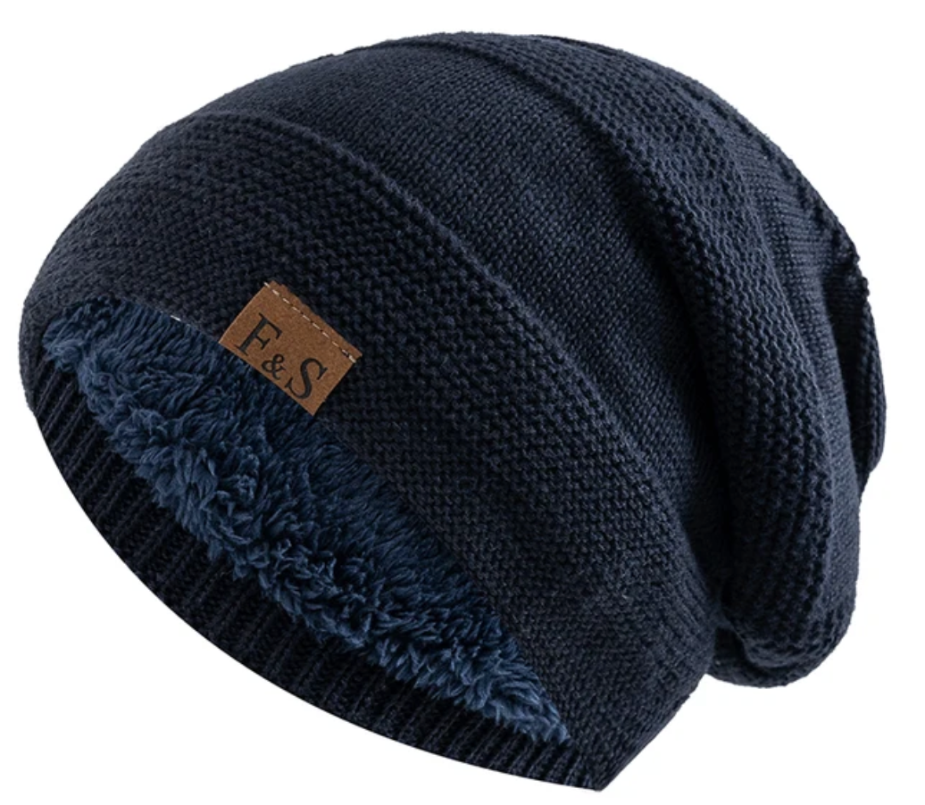 Veelzijdige herenmuts, een stijlvolle beanie die warmte en comfort biedt tijdens koude winterdagen. Essentiële wintermode.