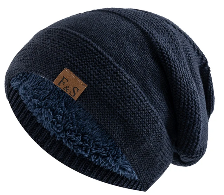 Veelzijdige herenmuts, een stijlvolle beanie die warmte en comfort biedt tijdens koude winterdagen. Essentiële wintermode.