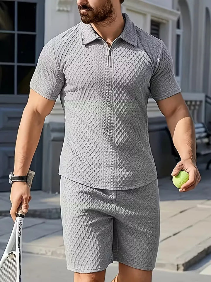 Comfortabele en stijlvolle heren zomer set met jacquard polo en casual shorts.
