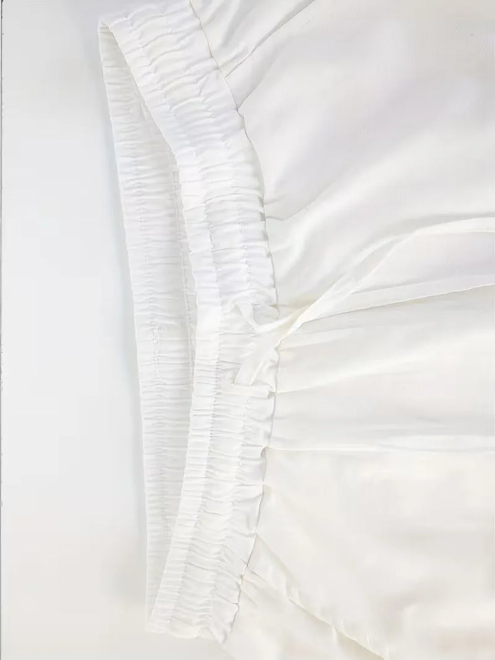 Comfortabel herenpak, tweedelig, met unieke mandarijnkraag. Geschikt voor zomerse dagen.