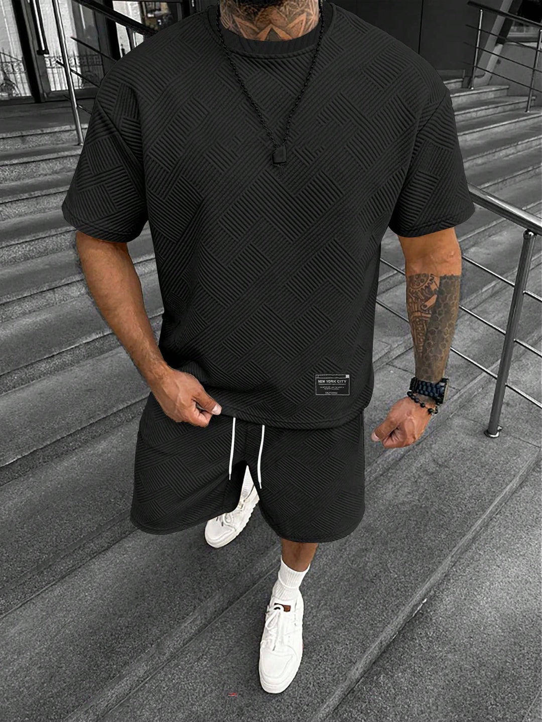 Heren zomerset: comfortabele sportieve shorts en oversized T-shirt voor vrije tijd. Casual mode, ademend.