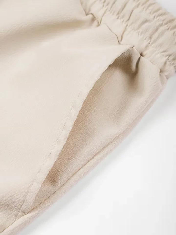 Luchtige heren casual shorts, geplooid ontwerp, elastische tailleband, perfect voor warme dagen.