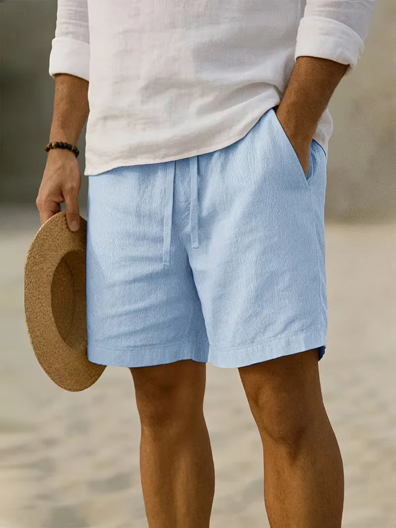 Stijlvolle heren vakantie shorts, geplooid, relaxte pasvorm, ideaal voor reizen.