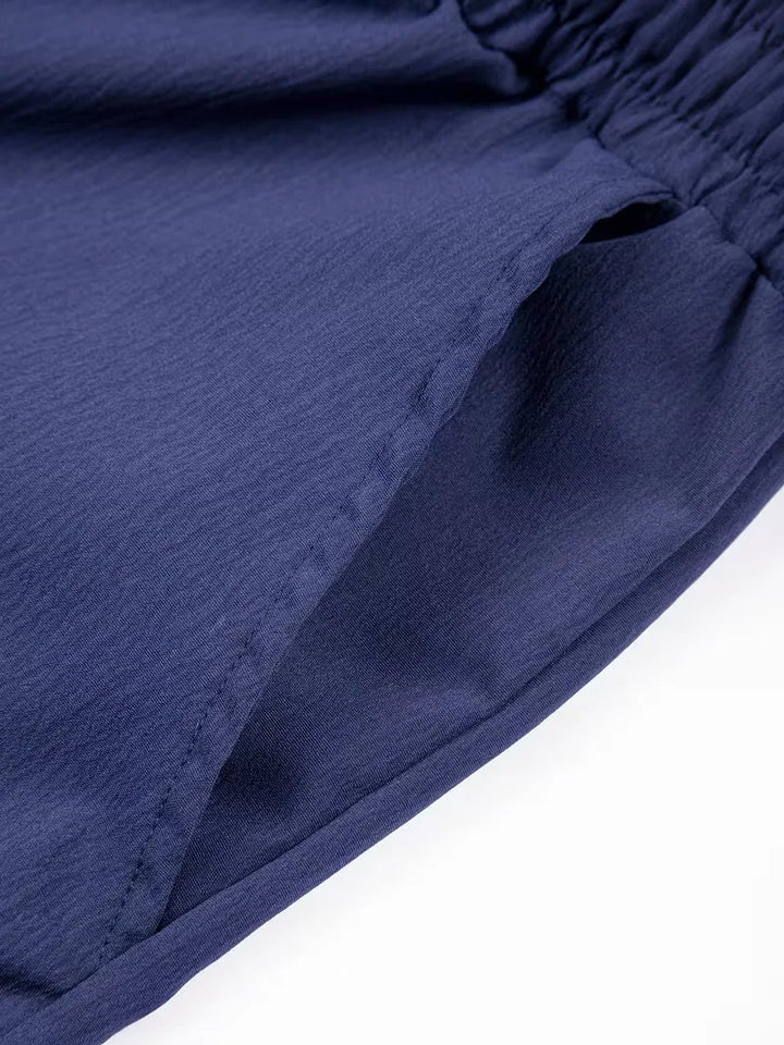 Relaxte heren zomershorts, marineblauw, met elastische taille en trekkoord.