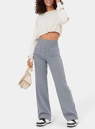 "High-waisted elastische broek met knoopdetails, hoge taille en rechte pijpen voor comfort en stijl, damesmode"