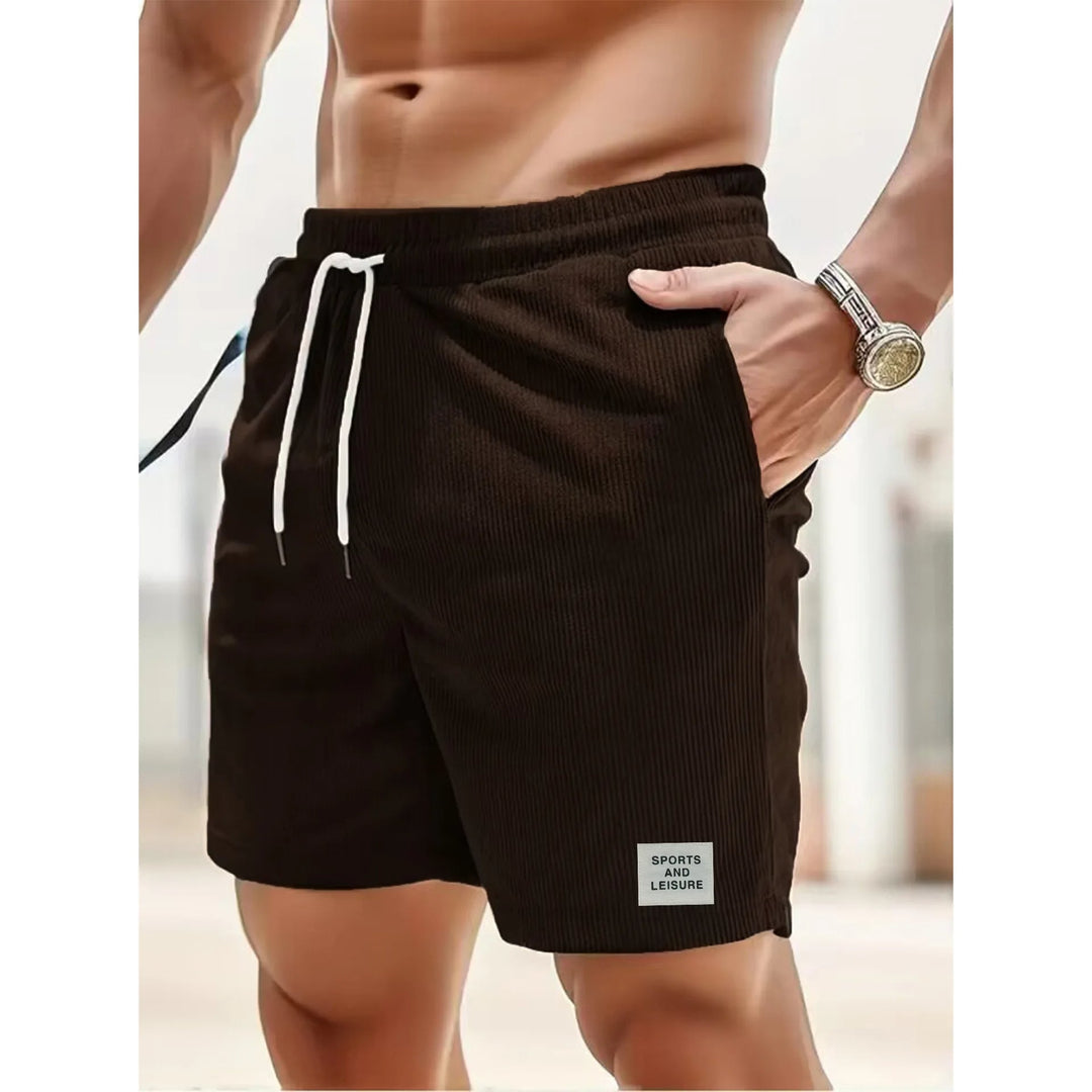 Plat gelegde Hoymans heren corduroy korte broek, representeert de zachte stof en casual pasvorm.