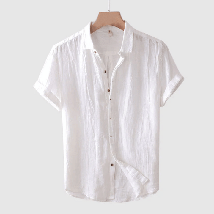 Fris blauw herenoverhemd, luchtig en ademend, ideaal voor zomerse casual of business casual looks.