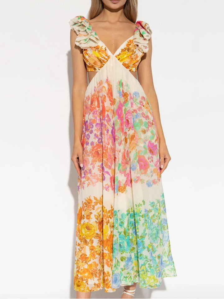 Lange bohemian dames maxi jurk met levendige meerkleurige print, ideaal als elegante zomer- of strandjurk.