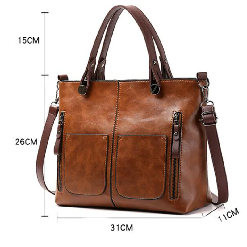 "Leren schoudertas met verstelbare riem; elegant, duurzaam leer in zwart, grijs en bruin, ideaal voor dames."