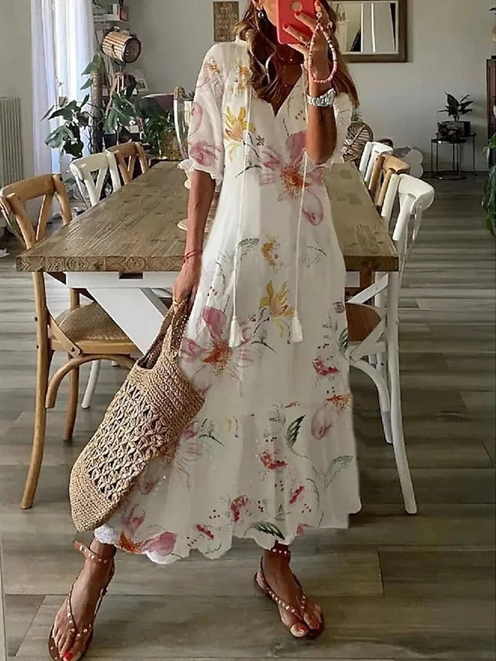"Lichtblauwe bohemian midi jurk, elegant en luchtig, perfect voor elke gelegenheid in stijlvolle bohemian stijl."