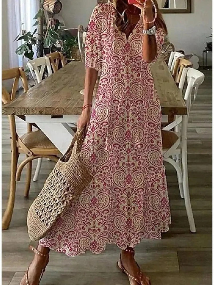 "Lichtblauwe bohemian midi jurk, elegant en luchtig, perfect voor elke gelegenheid in stijlvolle bohemian stijl."