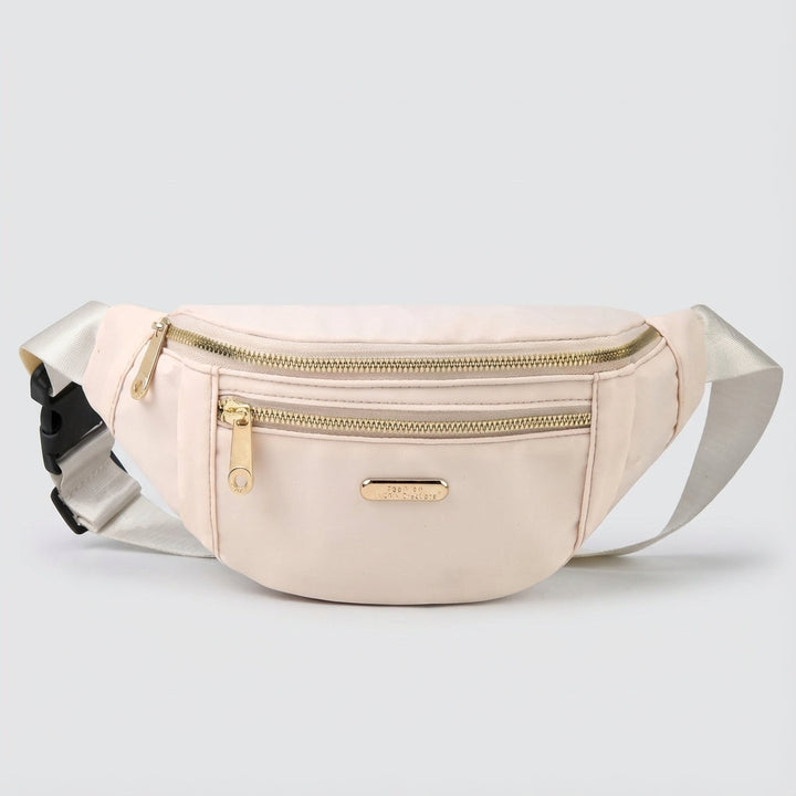 Roze lichtgewicht heuptas van duurzaam nylon, veelzijdige crossbody tas voor sport of reizen.