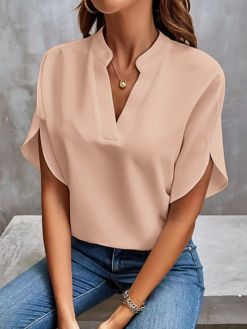 Lichtgewicht damesblouse met elegante afwerking, ademend ontwerp, perfect voor kantoor en casual gelegenheden.