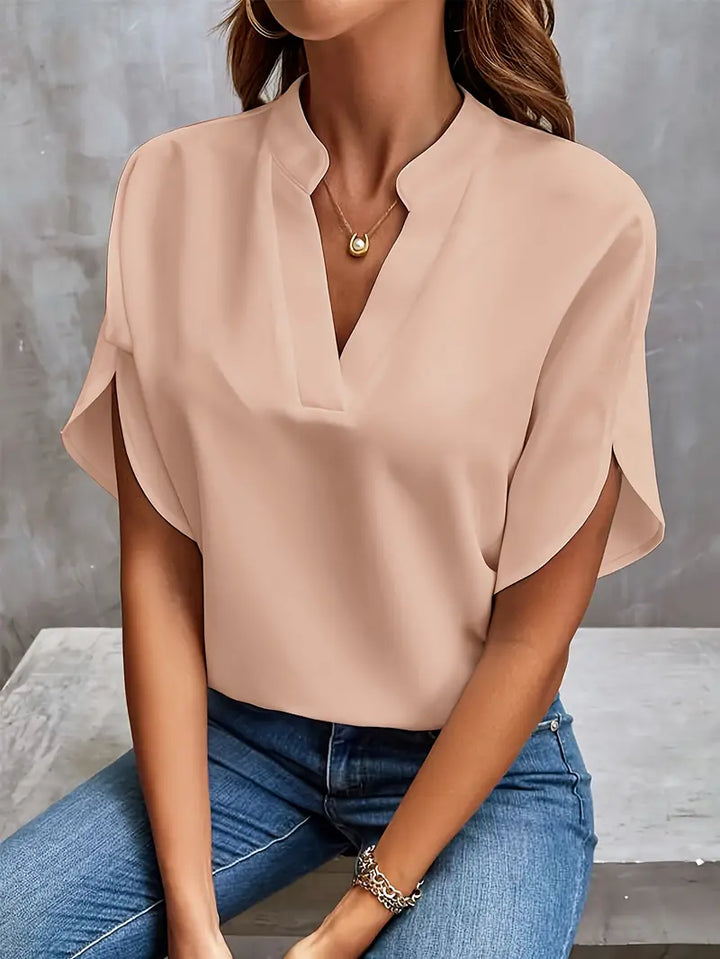 Lichtgewicht damesblouse met elegante afwerking, ademend ontwerp, perfect voor kantoor en casual gelegenheden.