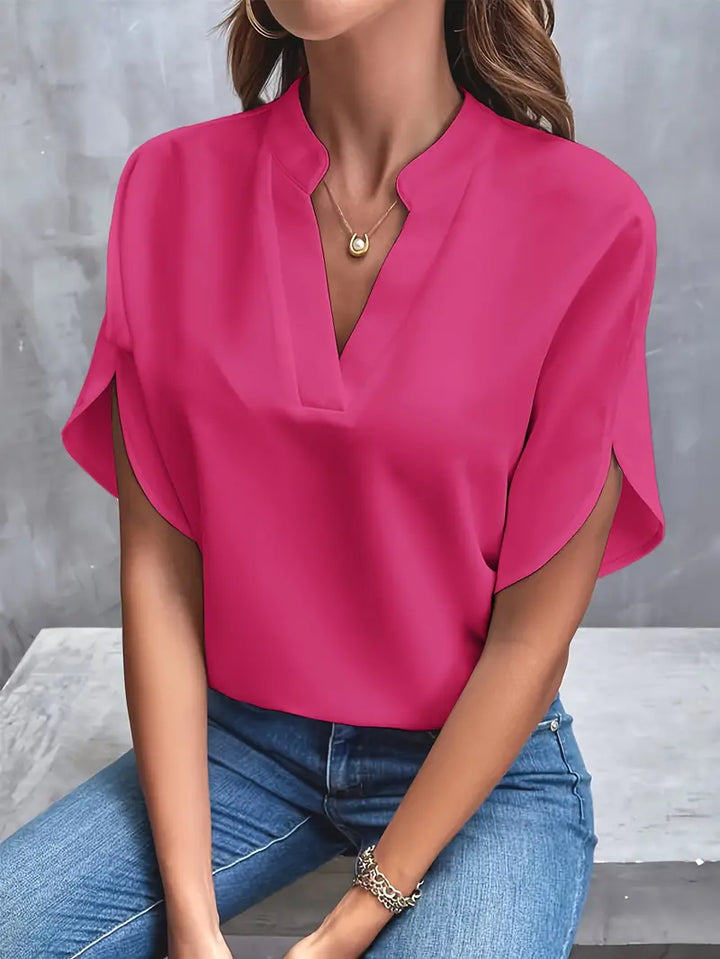 Lichtgewicht damesblouse met elegante afwerking, ademend ontwerp, perfect voor kantoor en casual gelegenheden.