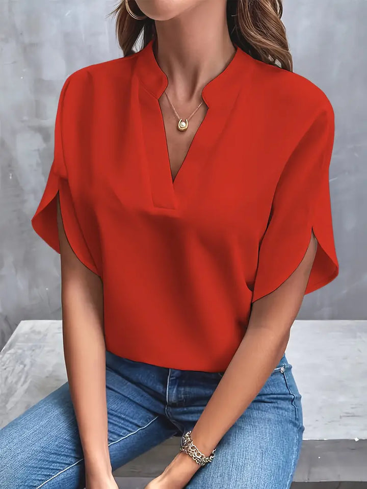 Lichtgewicht damesblouse met elegante afwerking, ademend ontwerp, perfect voor kantoor en casual gelegenheden.