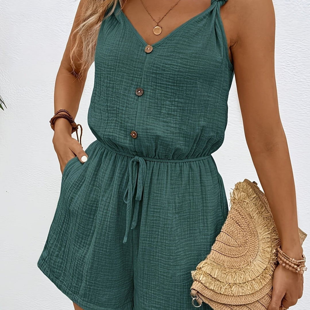 "Lichtgewicht geribde jumpsuit met trekkoord taille, speelse kraag, luchtige zomerstijl, vooraanzicht"